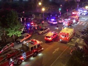 Rescue vehicles are seen following a shooting in Washington, D.C., Sept. 19, 2019, in this picture obtained from social media. (CHRIS G COLLISON/via REUTERS)