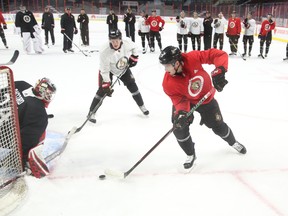 Ottawa Senators' Drake Batherson shoots on goalie Joey Daccord during practice this week. (JEAN LEVAC/Postmedia Network)