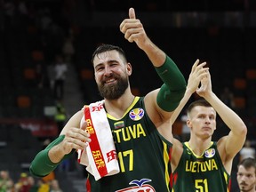 Lithuania's Jonas Valanciunas reacts after a match in China. (REUTERS/Kim Kyung-Hoon)