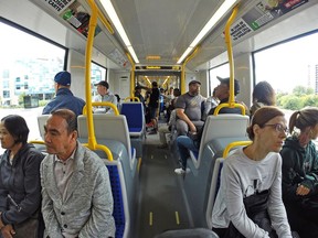 Passengers ride the train as the LRT is seen in operation on day 2 of the system up and running.