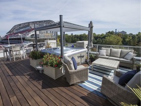 Jeff Hunt, co-owner of the Ottawa Redblacks, is selling his luxurious condo that overlooks TD Place. The outdoor living space and hot tub.
