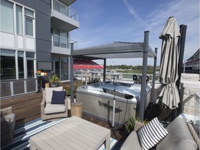 Jeff Hunt, co-owner of the Ottawa Redblacks, is selling his luxurious condo that overlooks TD Place. The outdoor living space and hot tub.