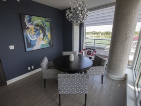 Jeff Hunt, co-owner of the Ottawa Redblacks, is selling his luxurious condo that overlooks TD Place. The dining area.
