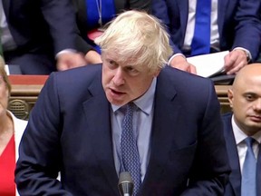 Britain's Prime Minister Boris Johnson speaks in parliament, which reconvened after the UK Supreme Court ruled that his suspension of the parliament was unlawful, in London on Wednesday, Sept. 25, 2019, in this screen grab taken from video.