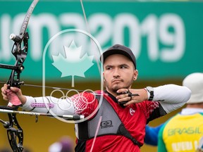 Ottawa’s Eric Peters competes in the men’s recurve bronze medal at the Lima Pan American Games this summer.   Christopher Morris/COC