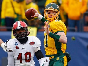 Darius Jackson (left) played for Jacksonville State. Shown here applying pressure against North Dakota State quarterback Carson Wentz during a FCS championship NCAA college football game on Jan. 9, 2016 in Frisco, Texas.