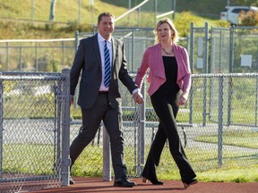 Conservative Leader Andrew Scheer and his wife Jill arrive to make a campaign announcement in Saint John, N.B. on Friday Sept. 20, 2019.