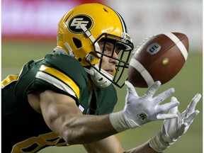 Edmonton Eskimos reciever Greg Ellingson (82) is unable to reel in a pass during fourth quarter CFL action against the Hamilton Tiger-Cats at Commonwealth Stadium, in Edmonton Friday Sept. 20, 2019.