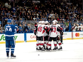 The Senators celebrate a goal by Max Lajoie against the Maple Leafs during the first period of Tuesday's game at St. John's, N.L.
