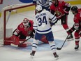 Toronto centre Auston Matthews scores against Ottawa goalie Filip Gustavsson in the third period of Wednesday's pre-season game.