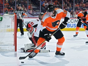 Nolan Patrick of the Philadelphia Flyers tries to get a shot off on Craig Anderson of the Ottawa Senators in the second period at Wells Fargo Center on March 11, 2019 in Philadelphia, Pa.