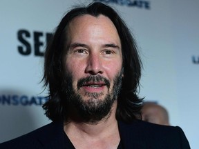 Keanu Reeves arrives for Lionsgate's special screening of "Semper Fi" at the Arclight theatre in Hollywood on Sept. 24, 2019.