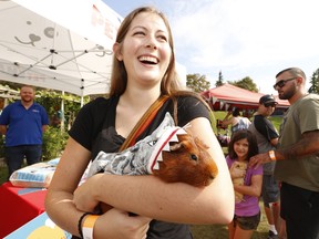 Sarah Peck, from Buffalo, N.Y. was at Greenwood Park with her pet Guinea Pig Archie Karl who was dressed up in a shark outfit for Halloween. It was all part of the 4th annual Picnic festival at Greenwood Park on Sunday September 22, 2019.