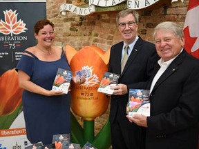 Mayor Jim Watson flanked by Jo Riding, general manager, Canadian Tulip Festival. and Grant Hooker, CEO, BeaverTails