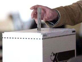 A voter casts a ballot