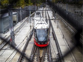 Commuters come and go from Tunney's Pasture Station.