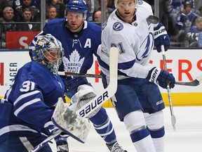 Tampa’s Steven Stamkos looks to tip a high puck at Maple Leafs goalie Frederik Andersen last night. Andersen gave up seven goals before his was pulled.  Claus Andersen/Getty Images