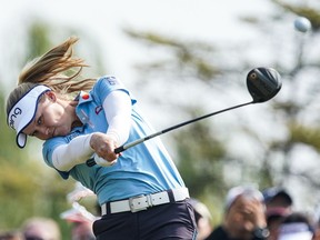 Brooke Henderson of drives from a tee during Final Round of 2019 Buick LPGA Shanghai at Shanghai Qizhong Garden Golf Club on Sunday in Shanghai, China.