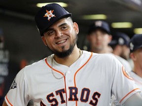 Roberto Osuna of the Houston Astros looks on from the dugout prior to Game 1 of the 2019 World Series against the Washington Nationals at Minute Maid Park on Oct. 22, 2019 in Houston.
