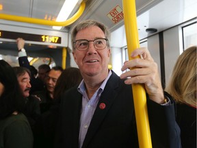 HAPPIER TIMES: Jim Watson enjoys the first LRT ride during the LRT launch, September 14, 2019.