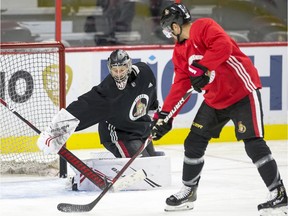 Craig Anderson makes a stop during Senators practice at Canadian Tire Centre on Tuesday.,