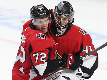 Thomas Chabot hugs goalie Craig Anderson after the buzzer ends the third period as the Ottawa Senators beat the Tampa Bay Lightning 4-2 in NHL action at the Canadian Tire Centre.