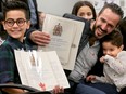 Anas Alargha Almasri, 39, couldn't stop smiling all the way through his citizenship ceremony with his three children (Lilyan, 13, Tarek, 12 and Yousef, 5) in downtown Ottawa on Friday