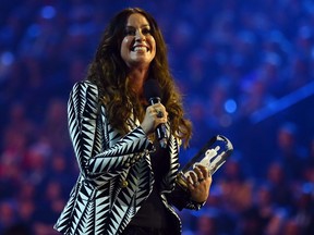 Alanis Morissette enters the Canadian Music Hall of Fame during the 2015 Juno Awards in Hamilton, Ont. on March 15, 2015.