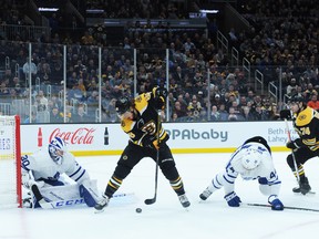 Bruins’ David Pastrnak dekes in front of Maple Leafs goaltender Michael Hutchinson on Tuesday night in Boston. (USA TODAY SPORTS)
