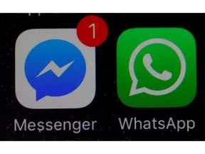 WhatsApp and Facebook messenger icons are seen on an iPhone in Manchester , Britain March 27, 2017.