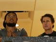 In this April 5, 2015 file photo, actor Tom Cruise, right, and his son Connor watch the Maryland Terrapins play against the Connecticut Huskies during the NCAA Women's Final Four Semifinal at Amalie Arena in Tampa, Florida. (Mike Carlson/Getty Images)