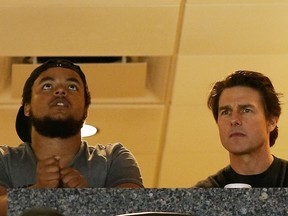 In this April 5, 2015 file photo, actor Tom Cruise, right, and his son Connor watch the Maryland Terrapins play against the Connecticut Huskies during the NCAA Women's Final Four Semifinal at Amalie Arena in Tampa, Florida. (Mike Carlson/Getty Images)