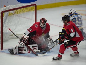 Ottawa Senators goalie Anders Nilsson makes a save on a shot from St. Louis Blues defenceman Vince Dunn in the third period at the Canadian Tire Centre.