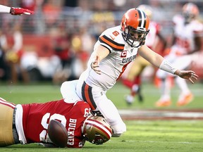 Quarterback Baker Mayfield of the Cleveland Browns fumbles as he is tackled by DeForest Buckner of the San Francisco 49ers at Levi's Stadium on October 7, 2019 in Santa Clara, California. (Ezra Shaw/Getty Images)