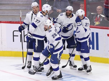 Tampa Bay players celebrate the tying goal in the third period as the Ottawa Senators take on the Tampa Bay Lightning in NHL action at the Canadian Tire Centre. Photo by Wayne Cuddington / Postmedia