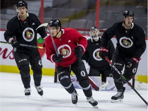 Ottawa Senators (left to right) Nikita Zaitsev, Tyler Ennis, goaltender Craig Anderson, and Thomas Chabot during team practice on Tuesday.