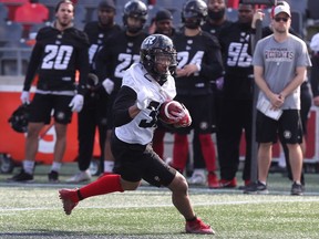 The Ottawa Redblacks' John Crockett runs the ball during practice on Tuesday, Oct. 29, 2019. He says he's not back to 100 per cent, but he's feeling good.
