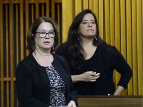 Independents Jane Philpott, left, and Jody Wilson-Raybould vote in the House of Commons on April 9. They're running for re-election as independents, and Rick Gibbons says voters should try to determine their own Jane or Judy when casting ballots for local MPs in Monday's election.