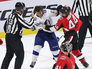 Brayden Point and Jean-Gabriel Pageau fight in the second period as the Ottawa Senators take on the Tampa Bay Lightning in NHL action at the Canadian Tire Centre. Photo by Wayne Cuddington / Postmedia
