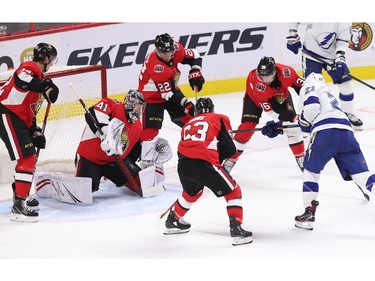 Craig Anderson stops a shot from from Brayden Point in the second period as the Ottawa Senators take on the Tampa Bay Lightning in NHL action at the Canadian Tire Centre. Photo by Wayne Cuddington / Postmedia