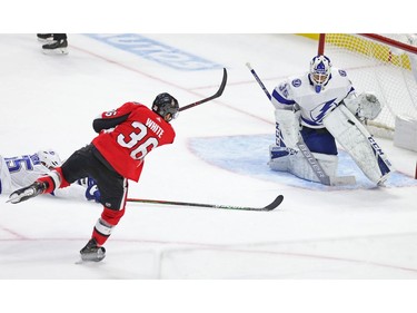 Colin White scores on Curtis McElhinney in the second period as the Ottawa Senators take on the Tampa Bay Lightning in NHL action at the Canadian Tire Centre. Photo by Wayne Cuddington / Postmedia