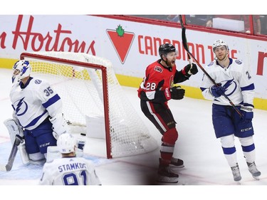 Connor Brown celebrates the second Senators goal on Curtis McElhinney behind Brayden Point in the second period as the Ottawa Senators take on the Tampa Bay Lightning in NHL action at the Canadian Tire Centre. Photo by Wayne Cuddington / Postmedia