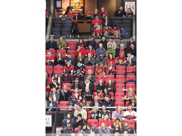Senators owner Eugene Melnyk sits in his box with a number of empty seats below him in the second period as the Ottawa Senators take on the Tampa Bay Lightning in NHL action at the Canadian Tire Centre. Photo by Wayne Cuddington / Postmedia