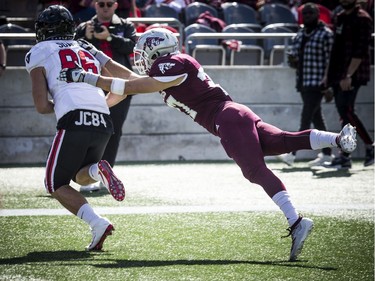 Ravens #86 Quinton Soares wasn't stopped by Gee-Gee's #27 Cody Cranston.