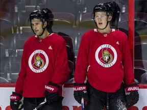 Ottawa Senators forwards Colin White (left) and Brady Tkachuk. (ERROL McGIHON/Ottawa Sun files)