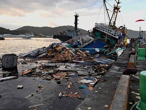 This picture taken on Oct. 1, 2019 shows the wreckage of a fishing boat after a bridge collapsed in the Nanfangao fish harbour in Suao township in Ilan county, eastern Taiwan.