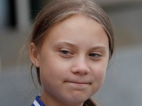 Swedish climate change teen activist Greta Thunberg joined a climate strike march to the Alberta Legislature in Edmonton, Alberta, on Friday, Oct. 18, 2019.