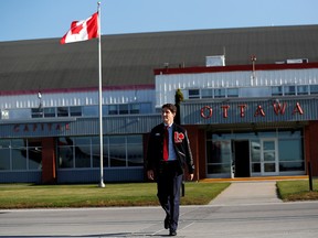 Liberal leader and Canadian Prime Minister Justin Trudeau walks on the tarmac at the airport during an election campaign visit to Ottawa on October 11, 2019. (REUTERS/Stephane Mahe)