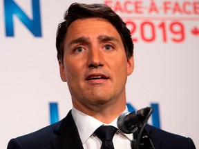 Liberal Prime Minister Justin Trudeau addresses the press after the French debate for the 2019 federal election, the "Face-a-Face 2019" presented in the TVA studios, in Montreal on Oct. 2, 2019.