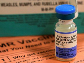 A vial of measles, mumps and rubella vaccine and an information sheet is seen at Boston Children's Hospital in Boston, Mass., Feb. 26, 2015.